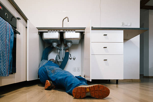 Professional Drain Cleaning technician working in Monticello, MS